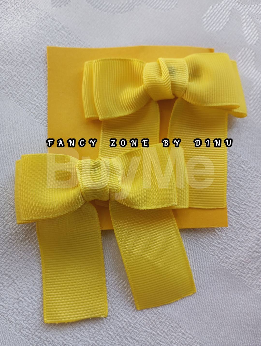 TAIL BOW HAIR CLIP