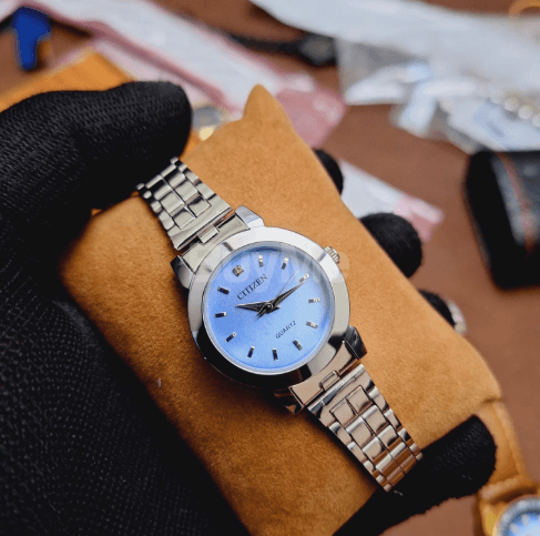 CITIZENS LADIES WATCH - LIGHT BLUE DIAL